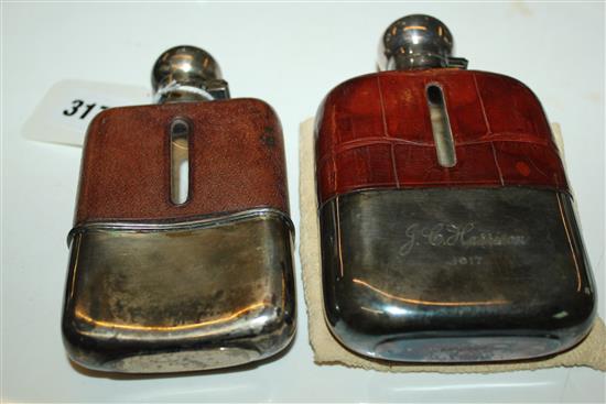 Silver & leather-mounted hip flask & a similar plated flask